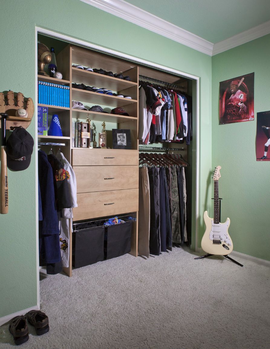 Reach-in closet in teenage boy's room