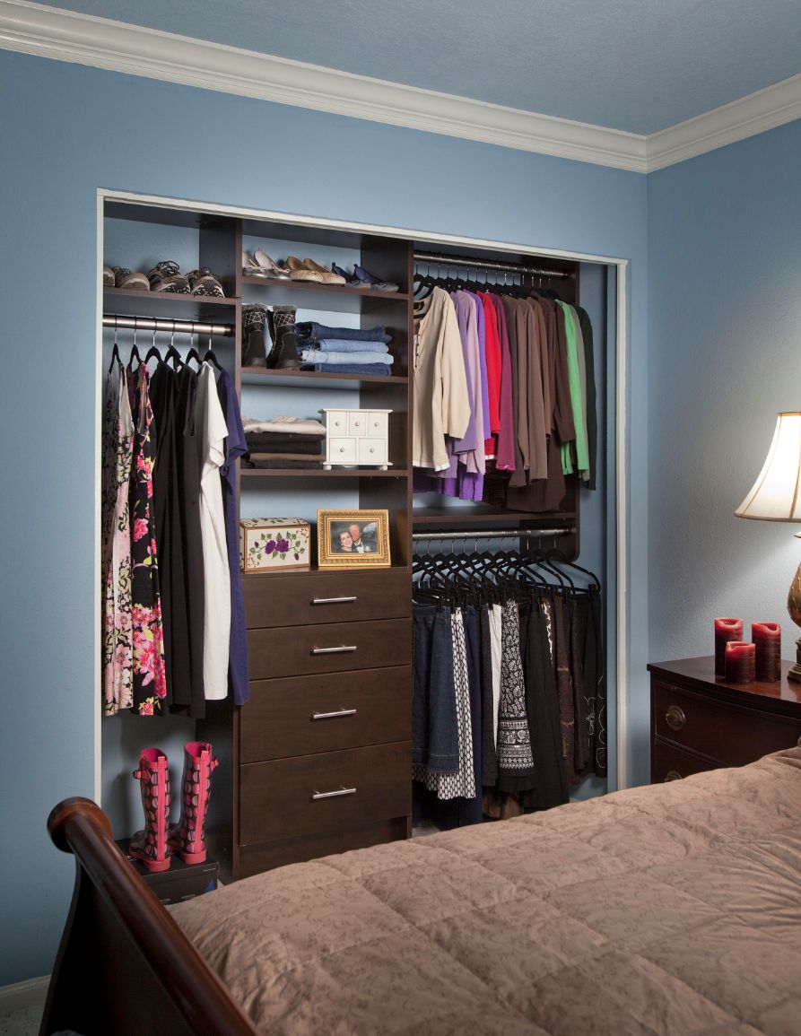 Modern reach-in closet in guest room