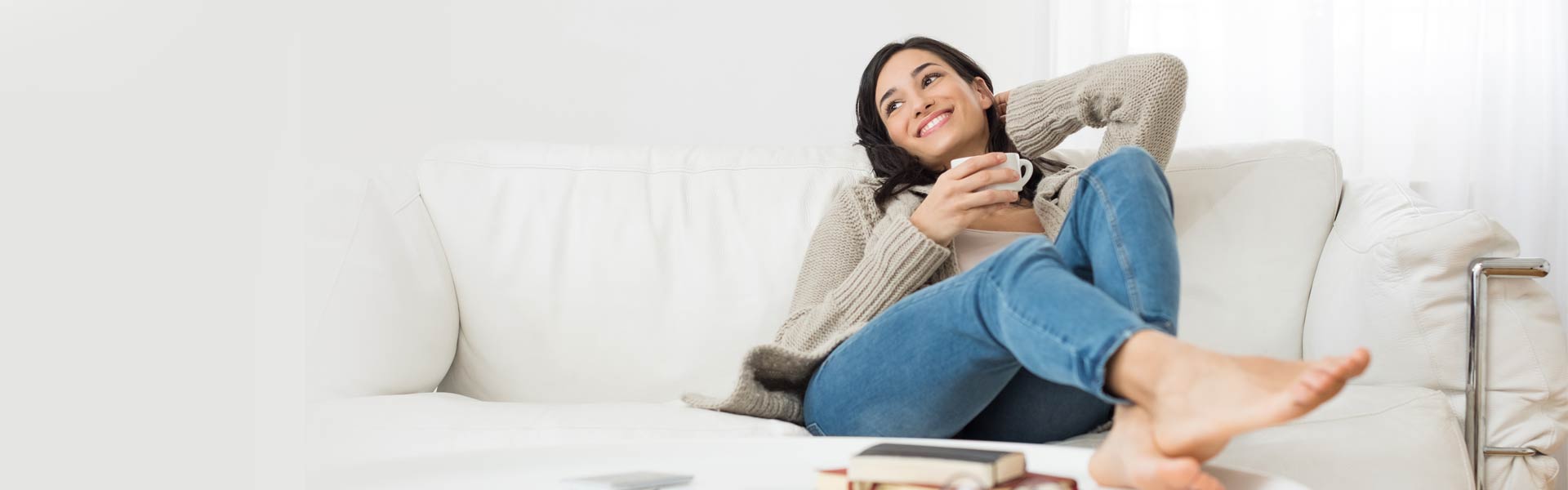closet-accessories Woman relaxing in her clean, organized home