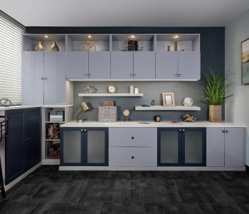 Modern home office with navy blue doors.